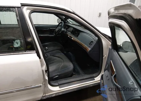 1998 Mercury Grand Marquis из США, поврежденный, VIN 2MEFM74W2WX663715